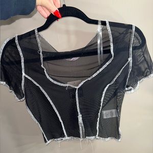 Pitaya. Mesh black crop top with white stitch lining. Super cute. Never worn.